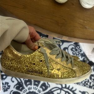 Golden glitter golden goose sneakers